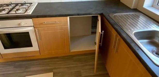 The couple finds a "secret room" when they open the kitchen cupboard