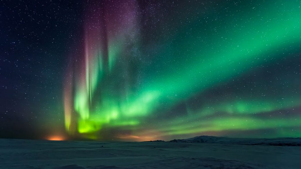 What are the aurora borealis and where do you see the phenomenon in the sky?