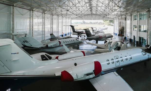 At Tropic Air Hangar, multimillionaire planes are available for charter, which helps reduce maintenance costs for this personal franchise.  Photo: Edilson Dantas / Agência O Globo