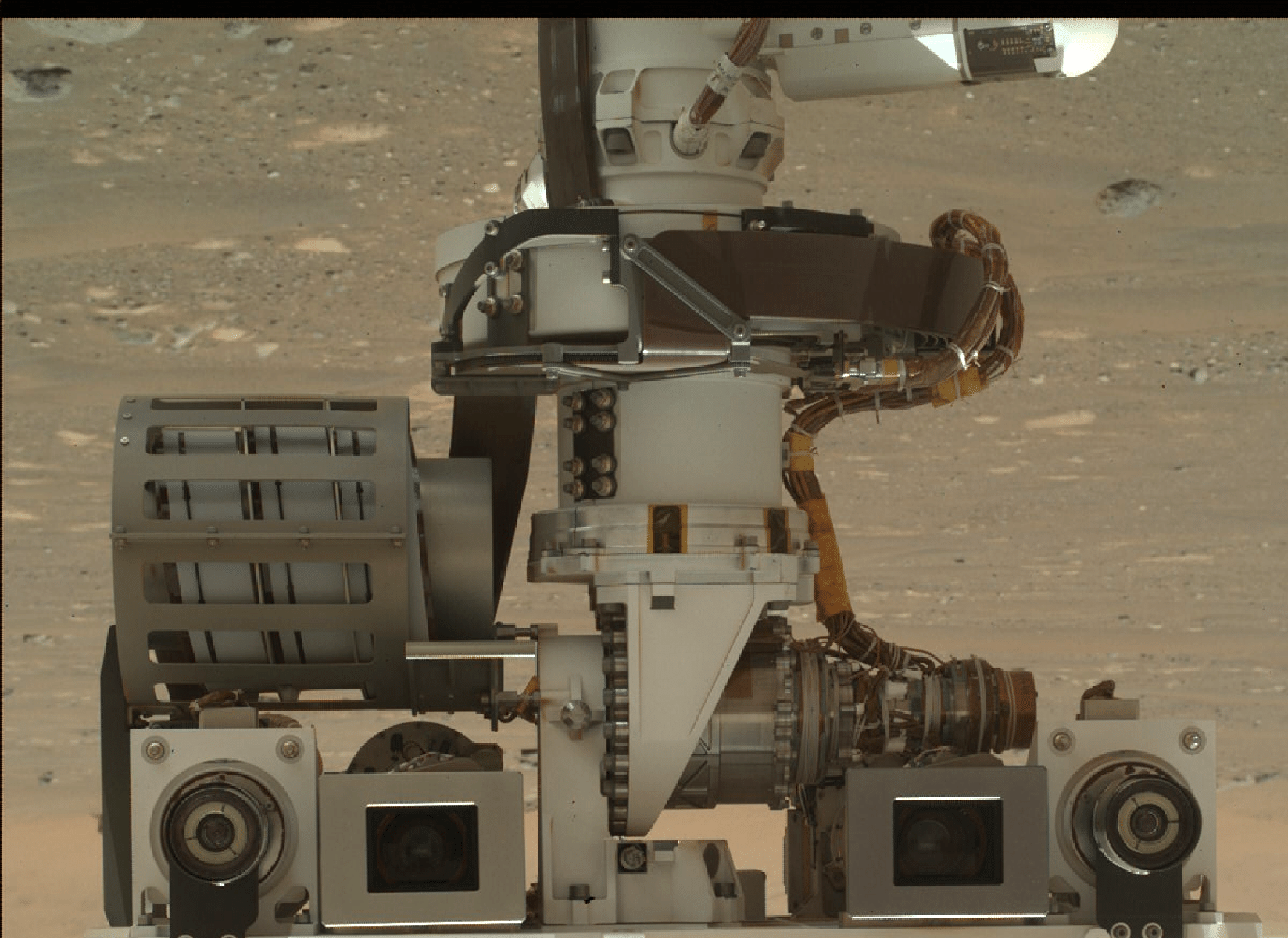 The photo was taken on April 5th by Perseverance rover.  In it, there are details of the car camera module - NASA / JPL-Caltech