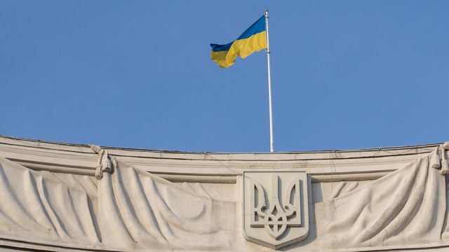 Ukrainian flag and shield