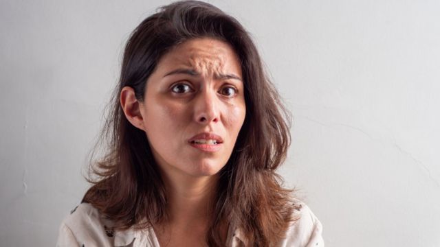 woman with worried face