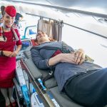 The world’s tallest woman flies for the first time in a 13-hour flight