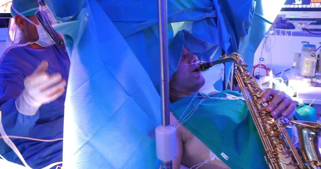 In Italy, a patient plays the saxophone during brain surgery
